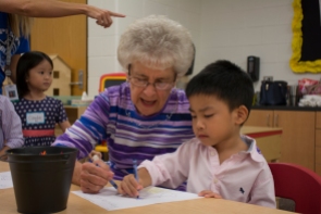 Barbara Peak, 80 of Oklahoma City, and Ethan Pham, 4 and in Pre-K .