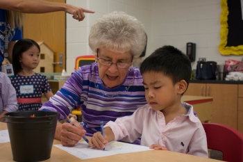 Barbara Peak, 80 of Oklahoma City, and Ethan Pham, 4 and in Pre-K .
